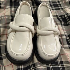 Chic White Loafers with Black Soles